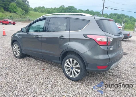 2017 Ford Escape Titanium z USA, uszkodzony, nr VIN 1FMCU0J99HUA84382